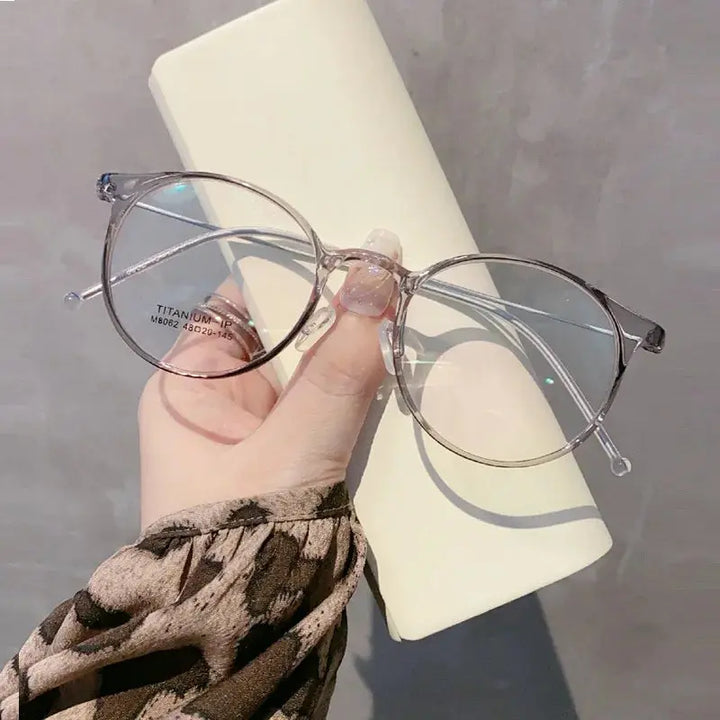 Bobbie 806200 Full Rim Women’s Polygon Round Acetate Titanium Frames — view 1 | Bobbie at FuzWeb