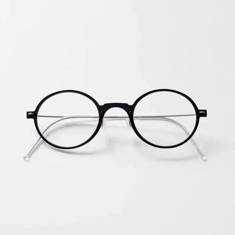Bobbie Unisex Full Rim Round Titanium Eyeglasses 650800 — view 1 | Bobbie at FuzWeb