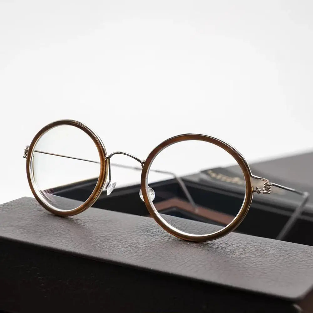 Bobbie 504522 Women’s Titanium Full-Rim Round Frames — view 1 | Bobbie at FuzWeb