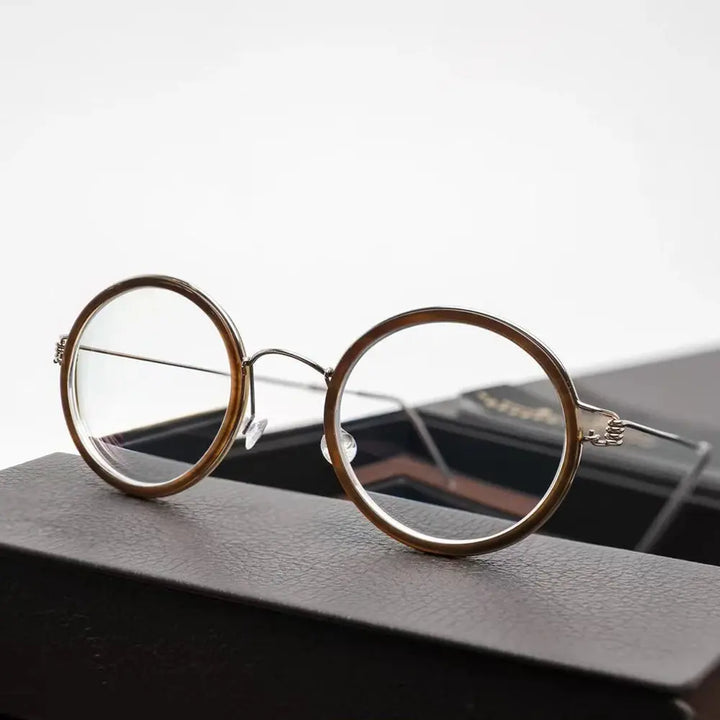 Bobbie 504522 Women’s Titanium Full-Rim Round Frames — view 1 | Bobbie at FuzWeb
