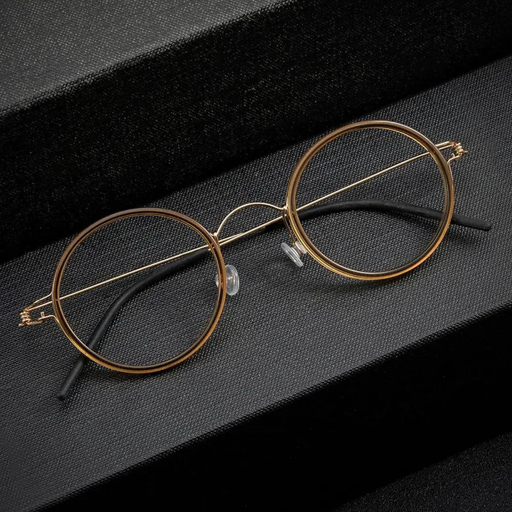Bobbie 504522 Women’s Titanium Full-Rim Round Frames FuzWeb