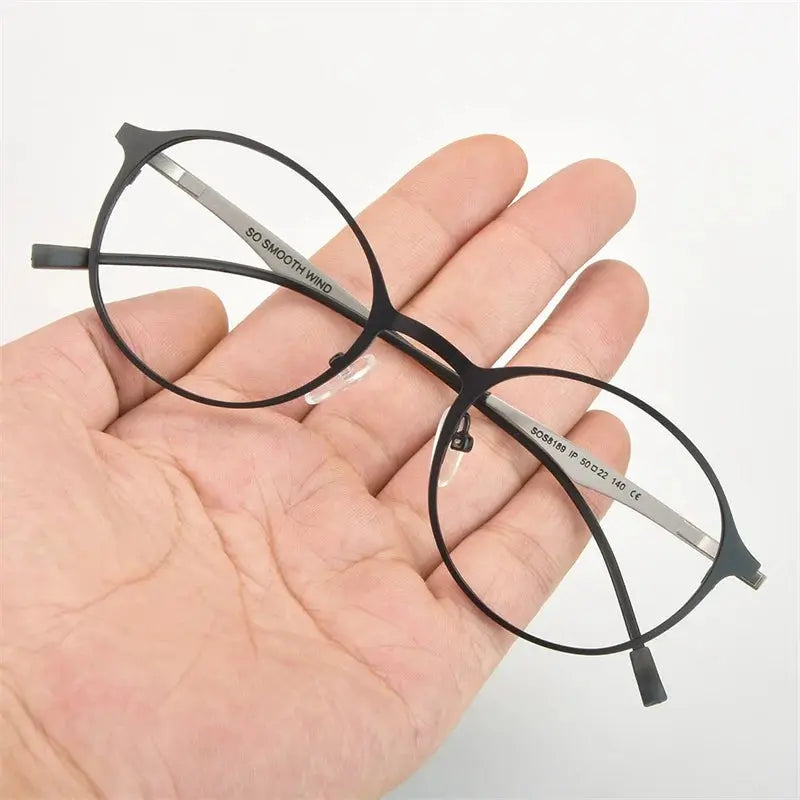 Bobbie 818900 Womens Polygon Round Titanium Full Rim Frames — view 1 | Bobbie at FuzWeb