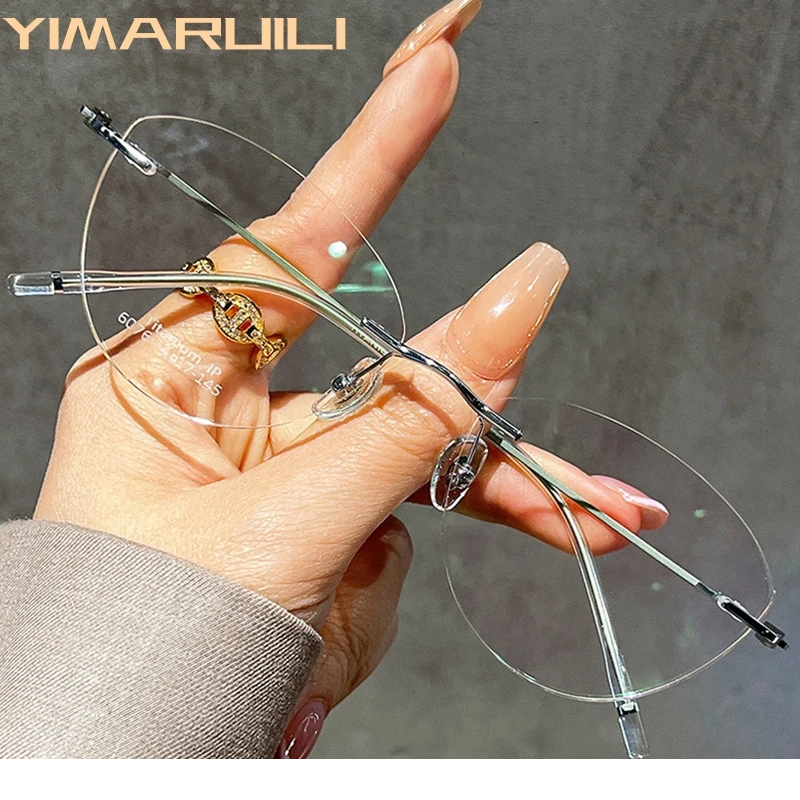 Yimaruili Women's Rimless Oval Cat Eye Titanium Eyeglasses 366076