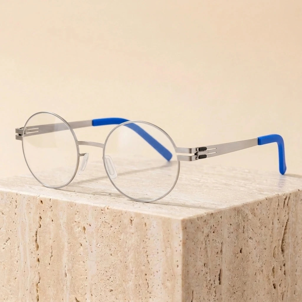 Aimee Unisex Full Rim Round Screwless Stainless Steel Eyeglasses 2004 — view 2 | Aimee at FuzWeb
