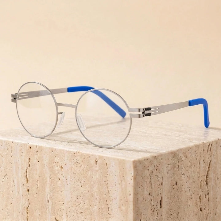 Aimee Unisex Full Rim Round Screwless Stainless Steel Eyeglasses 2004 — view 2 | Aimee at FuzWeb