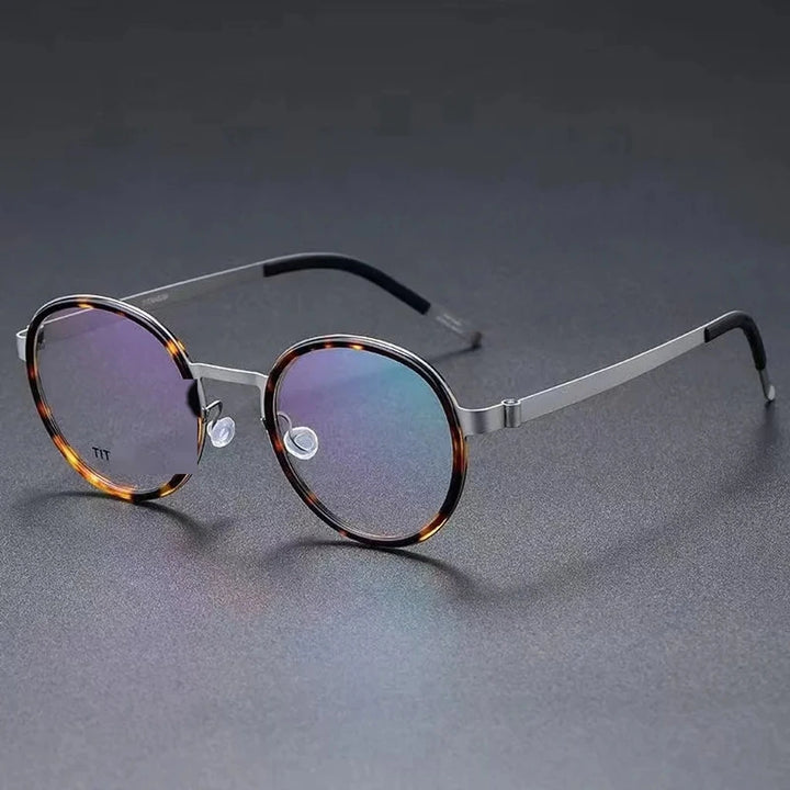 Aimee Unisex Full Rim Round Titanium Acetate Eyeglasses 9752 — view 1 | Aimee at FuzWeb