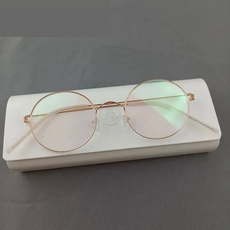Aimee Unisex Full Rim Round Screwless Titanium Eyeglasses 504520 - Small Rose Golden