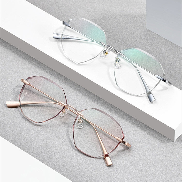 Chashma Womens Rimless Irregular Round Titanium Eyeglasses Tinted Lenses 99219 — view 1 | Chashma at FuzWeb