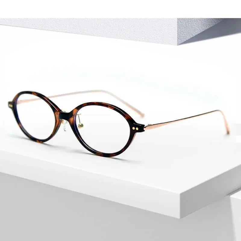 Kansept Unisex Full Rim Oval Tr 90 Metal Frames 180100 FuzWeb