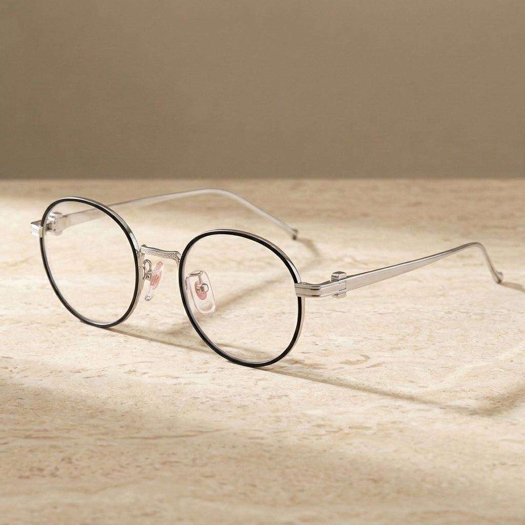 Chashma Ochki Women's Full Rim Round Titanium Eyeglasses 310293 - Silver — view 1 | Chashma Ochki at FuzWeb