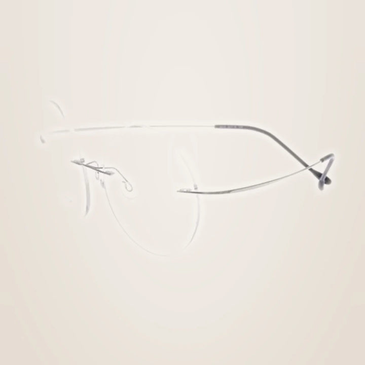 Chashma Ochki Unisex Rimless Round Titanium Eyeglasses 259613 - Silver