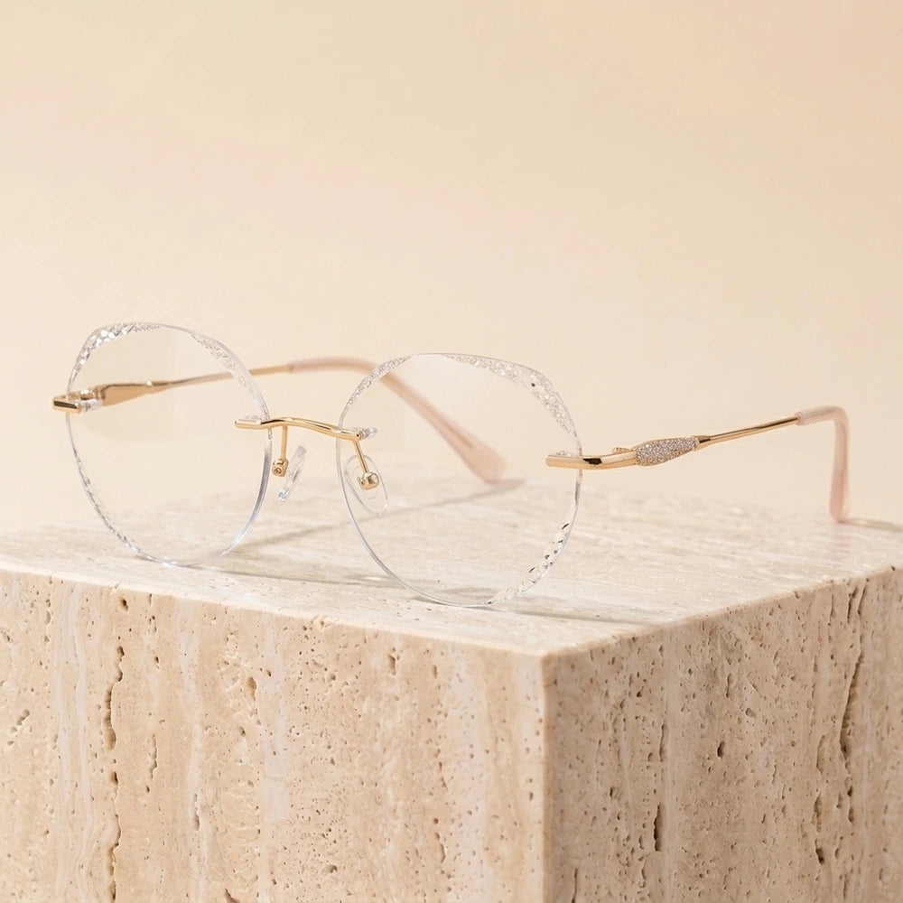 Chashma Ochki Women's Rimless Oval Glitter Edge Titanium Eyeglasses 318884 - Gold Clear