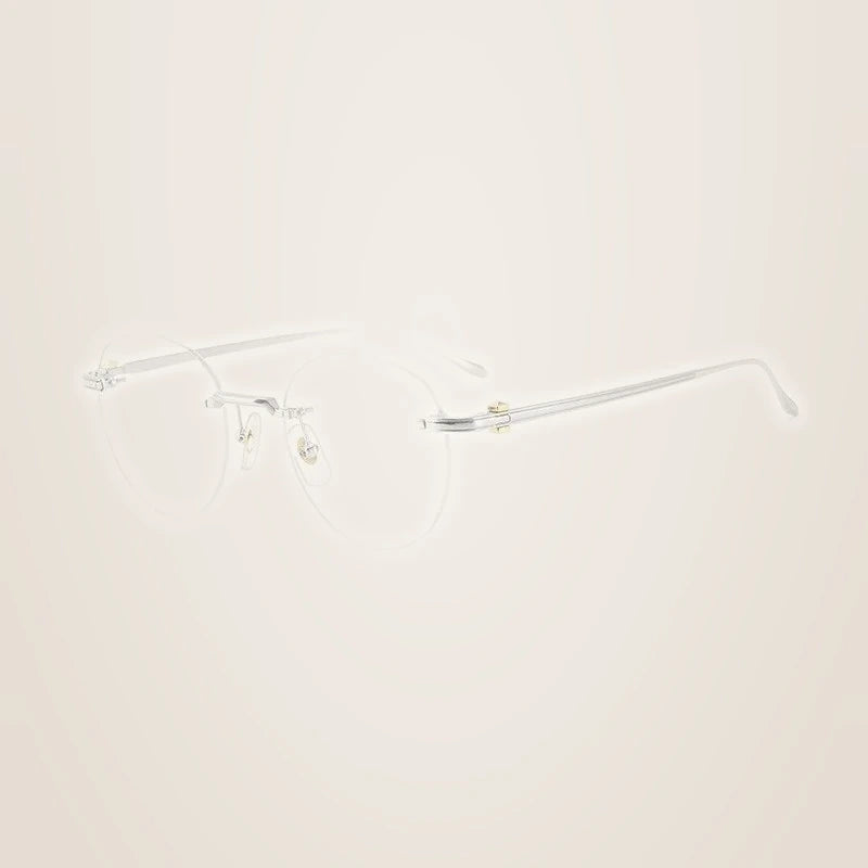 Chashma Ochki Women's Rimless Round Titanium Eyeglasses 310293 - Silver