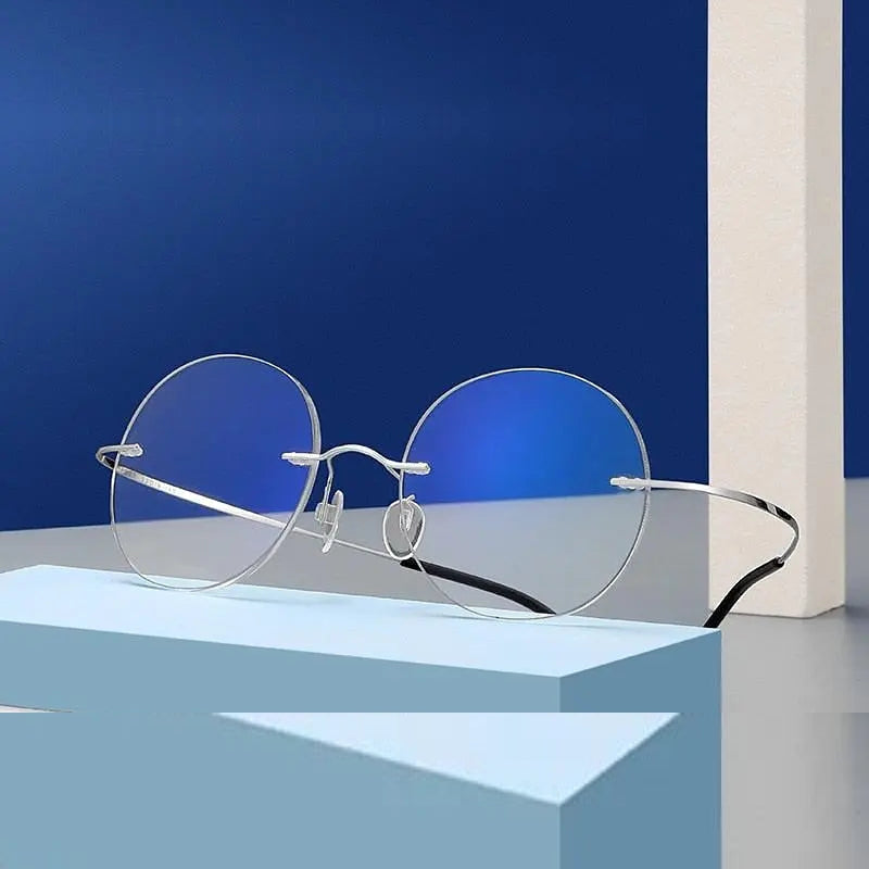 Chashma Unisex Rimless Round 2g Titanium Eyeglasses 6074