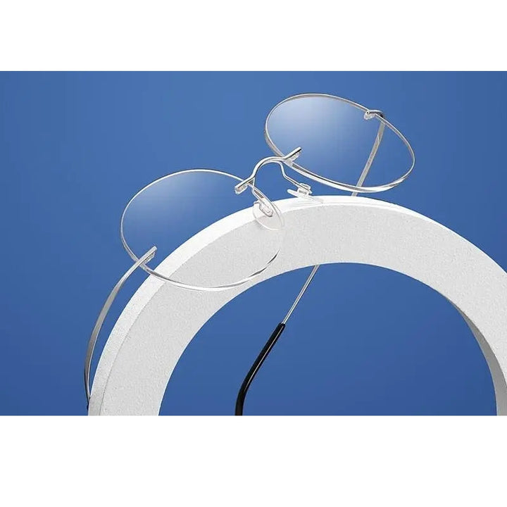 Chashma Unisex Rimless Round 2g Titanium Eyeglasses 6074