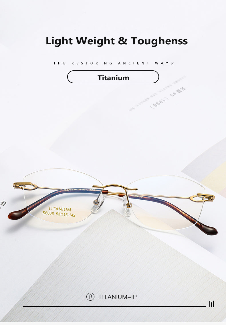 Oveliness Womens Rimless Oval Cat Eye Titanium Eyeglasses 196006 — view 1 | Oveliness at FuzWeb