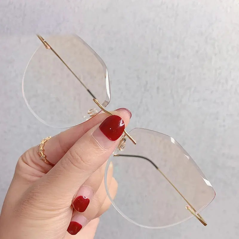 Chashma Ottica Women's Rimless Oval Cat Eye Titanium Eyeglasses 60744 - Gold Brown