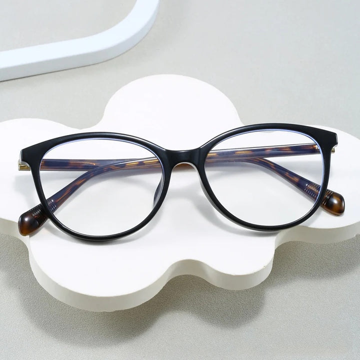 Kansept Womens Full Rim Round Tr 90 Titanium Reading Glasses 80234 — view 1 | Kansept at FuzWeb