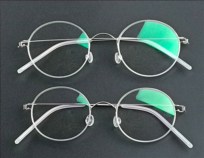 Aimee Unisex Full Rim Round Screwless Titanium Eyeglasses 504520 — view 1 | Aimee at FuzWeb