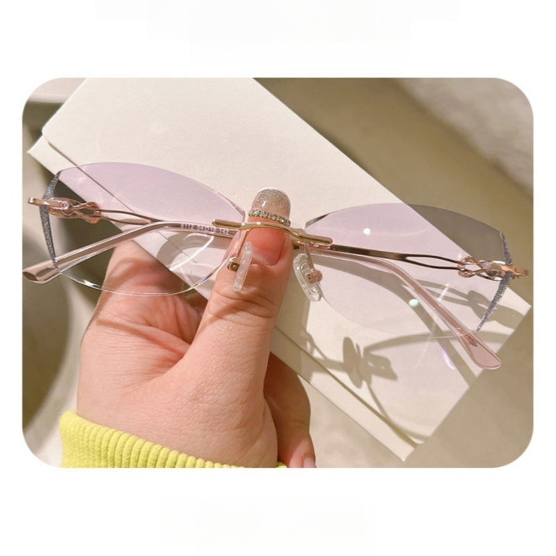 Summer Flower Womens Rimless Oval Titanium Eyeglasses 398112 — view 2 | Summer Flower at FuzWeb