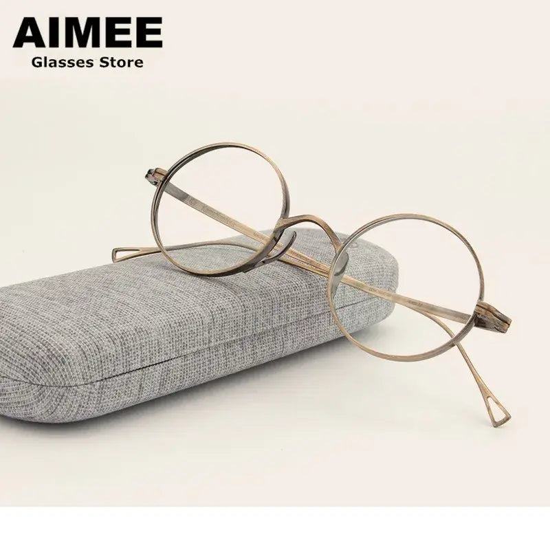 Aimee 999900 Women’s Full Rim Titanium Round Frames FuzWeb