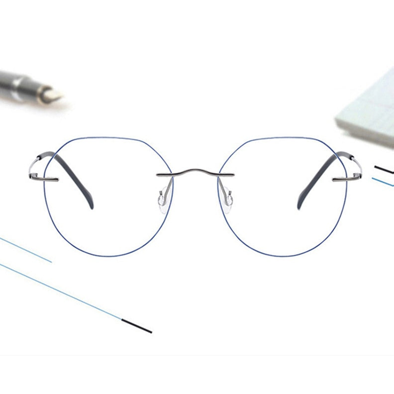 Chashma Womens Rimless Flat Top Round Titanium Eyeglasses 778408 — view 1 | Chashma at FuzWeb