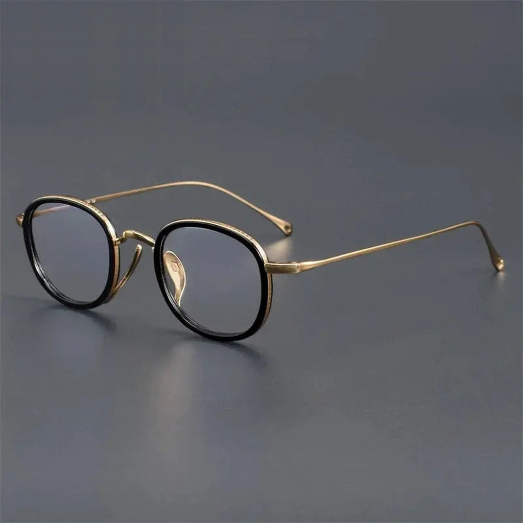 Chashma Unisex Youth's Full Rim Oval Titanium Acetate Eyeglasses 887309 - Black-Gold — view 1 | Chashma at FuzWeb