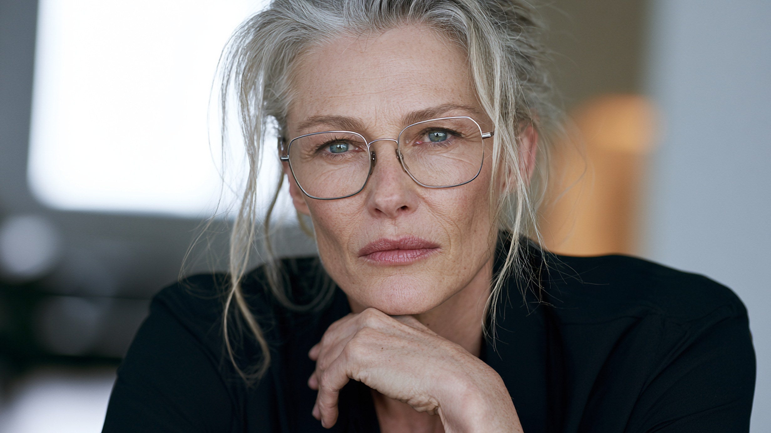 Woman wearing lightweight metal eyeglasses — Women's Eyeglasses at FuzWeb