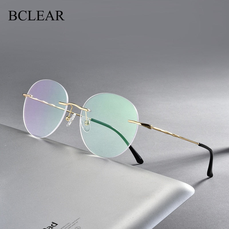 Unisex Round Rimless Titanium Alloy Frame Eyeglasses Customizable Lenses Zt7057 Rimless Bclear   