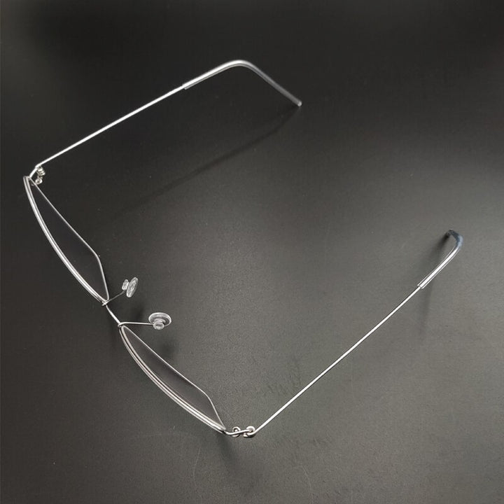 Women's Handcrafted Stainless Steel Triangle Frame Eyeglasses Customizable Lenses Frame Yujo   